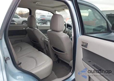 2009 Mercury Mariner Premier V6 z USA, uszkodzony, nr VIN 4M2CU87G69KJ05544